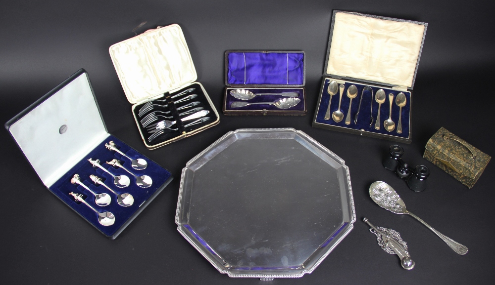 A selection of silver plate, to include; a salver, cased teaspoons, cased spoons, a bosun's whistle,