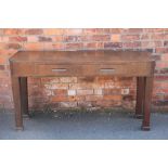 An Art Deco oak console table, with one long drawer, on tapered legs,