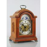 A modern walnut eight day bracket clock,