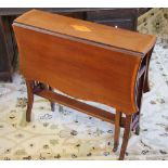An Edwardian satinwood inlaid mahogany 'butterfly' Sutherland table, with serpentine leaves,