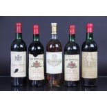 Two bottles of Chateau Tour Grand Mayne 1979; a bottle of Chateau Montrose 1975;