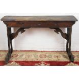 A Victorian pine altar table, with rounded rectangular top, on standard end supports, 79cm x 132cm