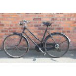 A lady's Raleigh sport vintage bicycle,