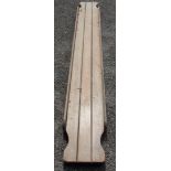 A long pine section possibly from a threshing box, with four handles,