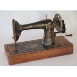 A Singer sewing machine, with original label,