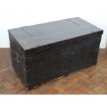A late 19th Century iron bound stained pine trunk,