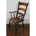 A 19th Century beech and ash kitchen chair, with ladder back and solid seat,
