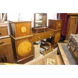 A 19th Century Continental mahogany pedestal sideboard, with two upper cupboards, each inset with