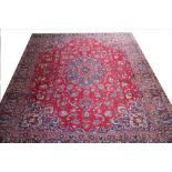 A Persian Kashan hand woven wool carpet,
