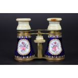 A pair of late 19th Century French enamel, ivory and lacquered brass opera glasses,