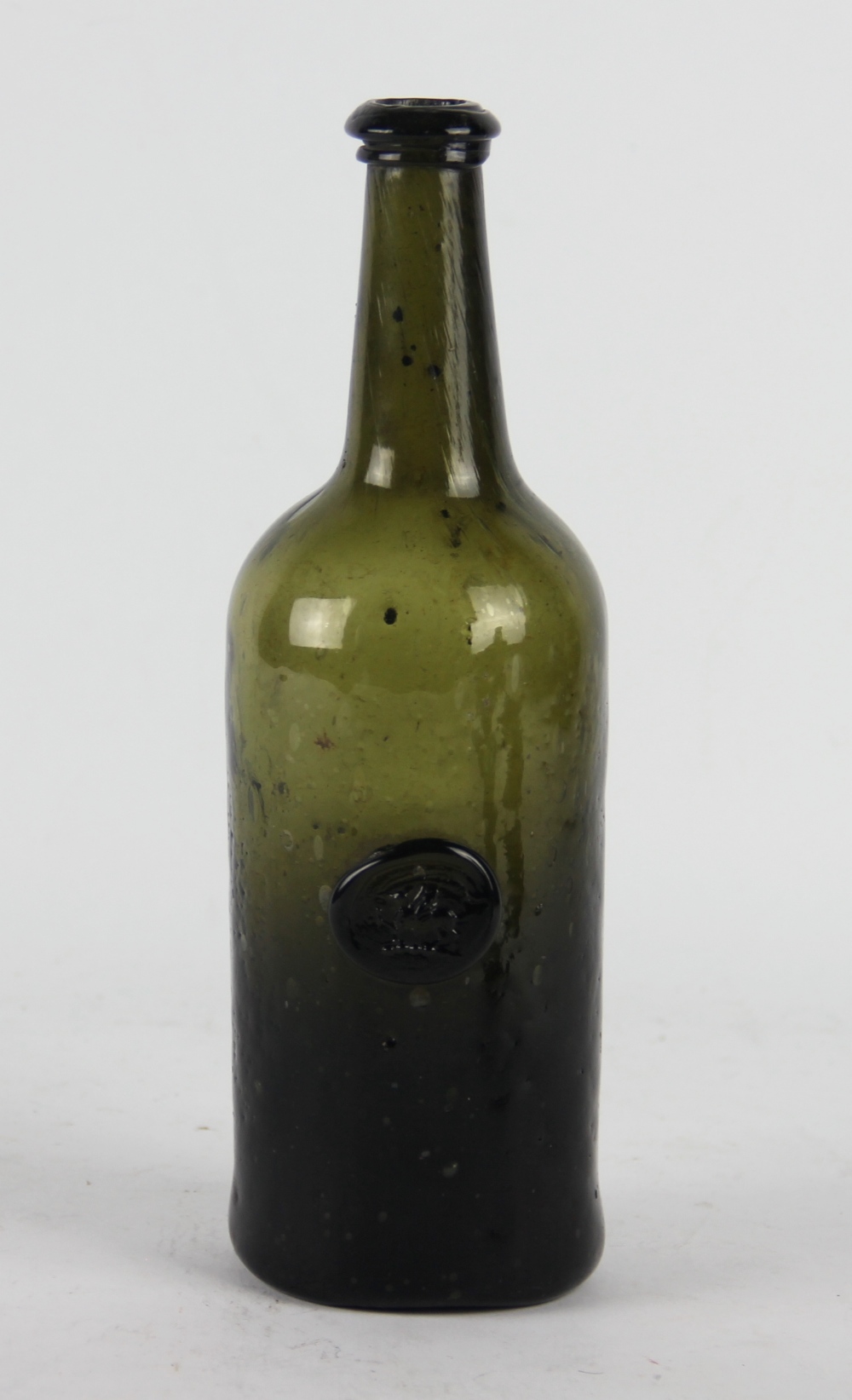 An early 19th green glass seal bottle,