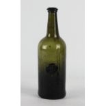An early 19th green glass seal bottle,