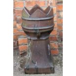 A crown top chimney pot,