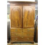 A George III inlaid mahogany linen press,