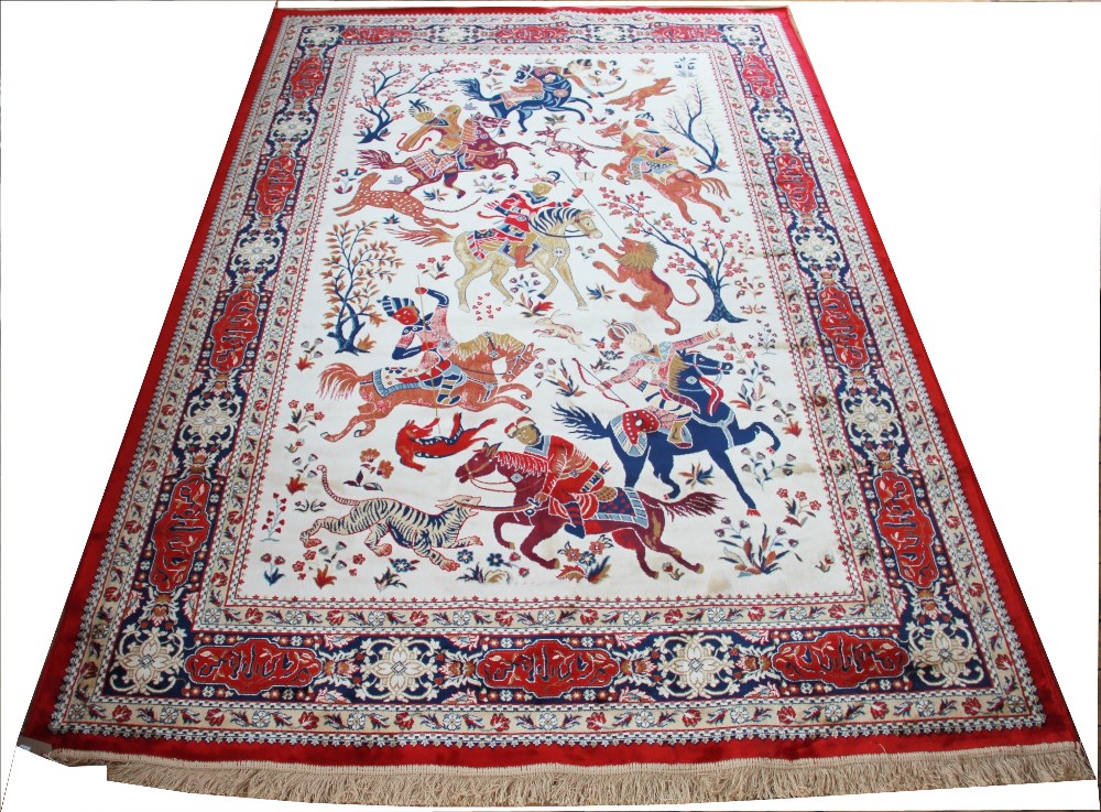 A Kashmir silk hunting scene carpet,