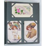 An album of Edwardian and later postcards, to include Christmas and New Years examples, World War I,