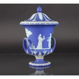 A 19th century Wedgwood blue Jasper ware twin handled vase and cover,
