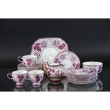 A Grays Pottery part tea service circa 1930 each piece decorated in pink lustre with vines and