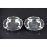 A pair of silver ash trays, Adie Brothers Ltd, Birmingham 1914,