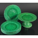 A 19th century Majolica part dessert service, comprising six 23cm plates and comport,