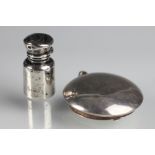 A silver locket Chester 1911, of circular plain polished form and with hinged cover,