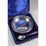 An Edwardian silver christening set, comprising bowl and spoon,