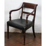 A Regency mahogany carver dining chair, with panelled back and upholstered seat,
