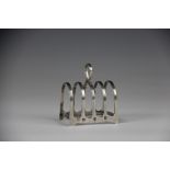 A George VI silver four division toast rack, Lowe & Sons, Chester 1938, 7.5cm, 2.