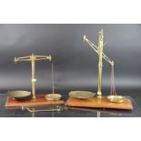 A set of Avery brass apothecary scales, on mahogany plinth, 60cm, a pair of F.