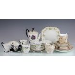 A Grosvenor China part tea service, decorated with flowers,