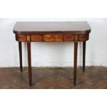 A George III mahogany tea table, with a reeded edge on tapered square legs (at fault),