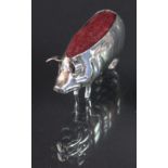 An Edwardian silver pig pin cushion, Sydney & Co, Birmingham 1905, realistically modelled,