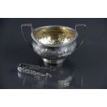 A George III silver sugar bowl, Robert & Samuel Henell, London 1804, repousee floral decoration, 11.