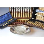 A collection of silver plated wares, to include, cased fish servers, a butter dish, circular salver,
