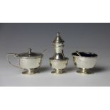 A George VI  three piece silver condiment set, with Celtic strapwork, Birmingham 1939, 4.