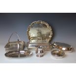 A 19th century silver plate entrée dish and cover, an oval entrée dish and cover, two baskets,