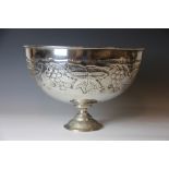 A continental silver plate pedestal punch bowl, embossed with fruiting vines,