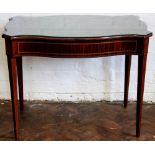 An Edwardian inlaid mahogany serpentine occasional table, on tapered square legs,