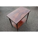 An Edwardian inlaid mahogany folding card table, with undertier on tapered legs,