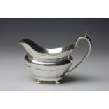 A George V silver milk jug, Walker and Hall, Sheffield 1918, 4.