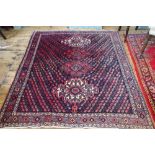 A Balouch wool ground rug worked with three gulls against a blue ground,