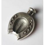 Hunting interest - a Victorian novelty silver scent bottle and lid,