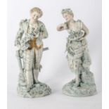 COPPIA SCULTURE in biscuit raffiguranti "gentildonna" e "gentiluomo". Austria XIX secolo Misure: h