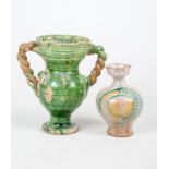 DUE ANFORETTE in ceramica smaltata e decorata. Sicilia XIX secolo Misure: h cm 17 - 22,5