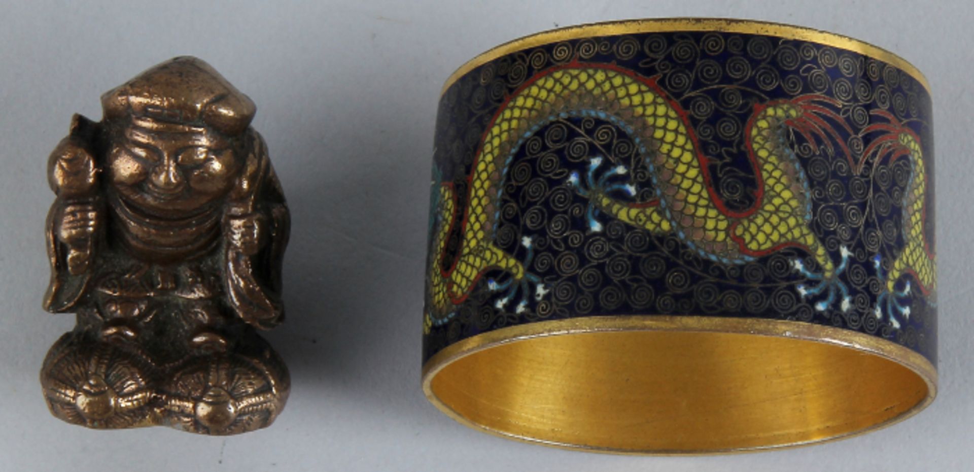 Two antique Chinese objects 1900: 1x napkin ring with cloisonne enamel inlay and dragon motif and 1x
