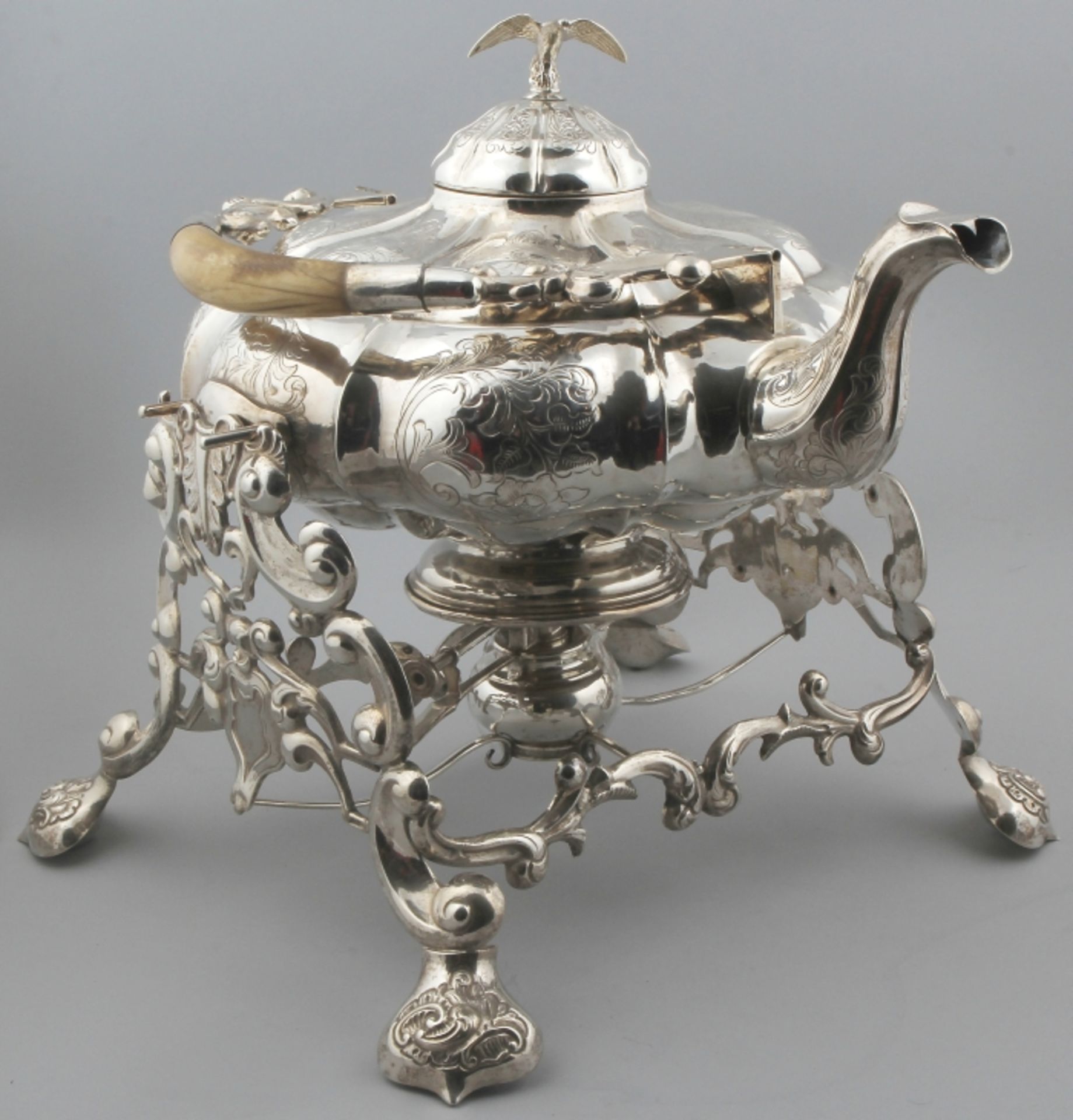 Beautifully hand-chased silver boulloir with legs grip, crowned with eagle and engraved around and