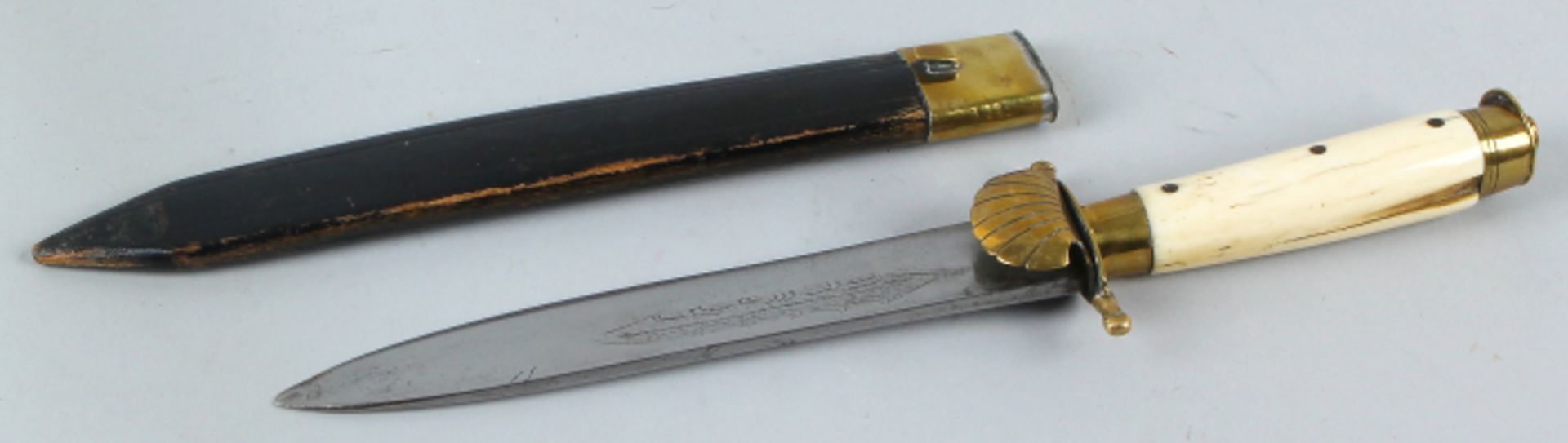Dagger with brass and bone handle 1900 in good condition 31cm.     Dolch mit Messing und