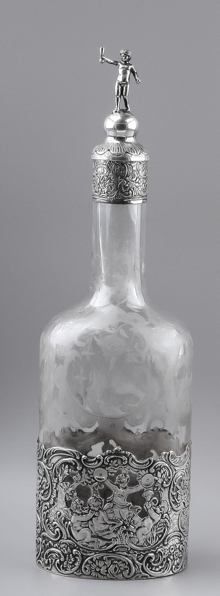 19th century decanter etched in silver frame with silver collar and cap, decorated with floral