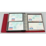 Red folder with several machine seals include: Australia, Brasil Ceska republika, Finland, Norway,
