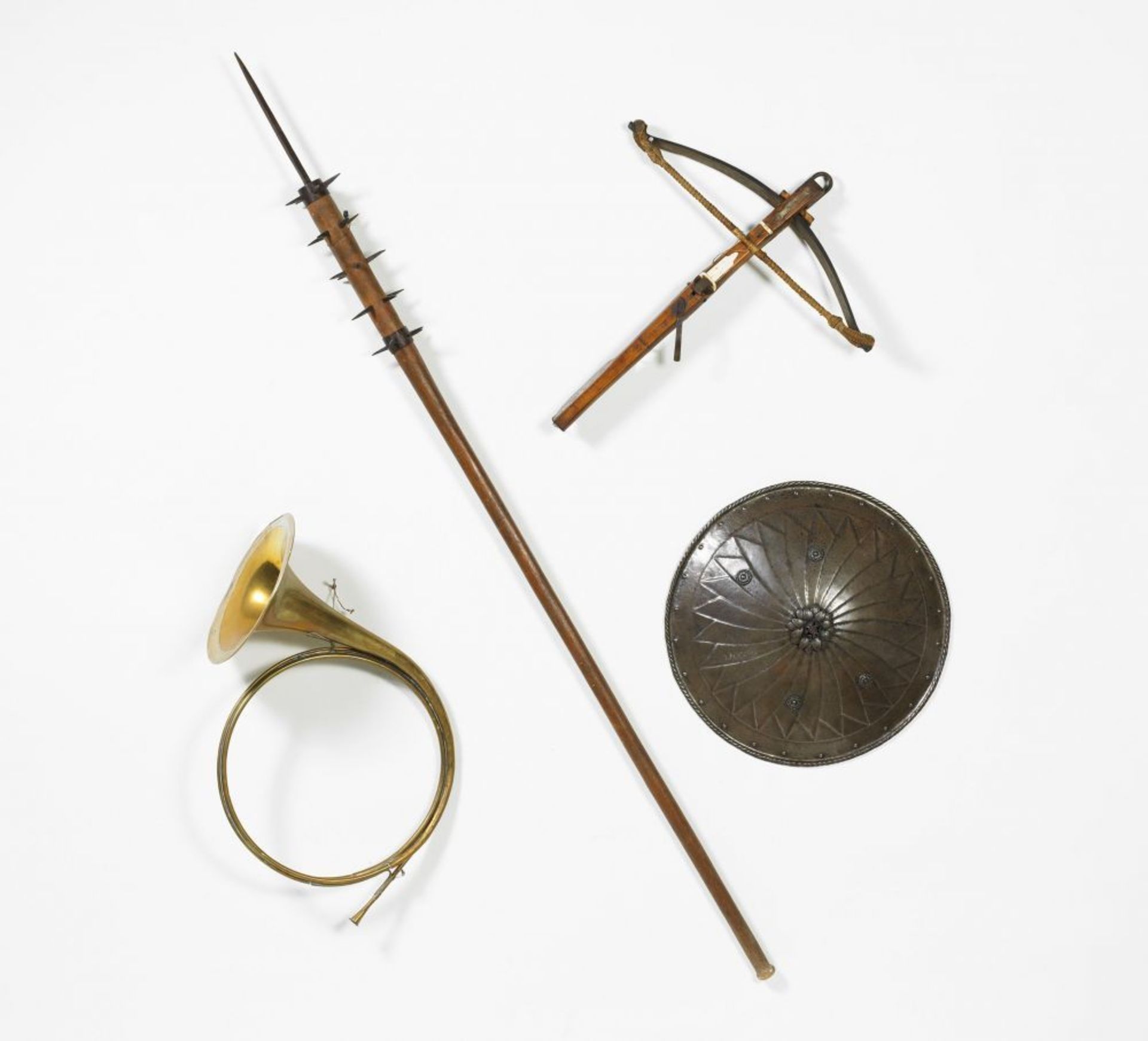 ASSORTED LOT: CROSSBOW, SHIELD, POLE WEAPON AND HORN  Wood, metal and partly bone. Condition B/